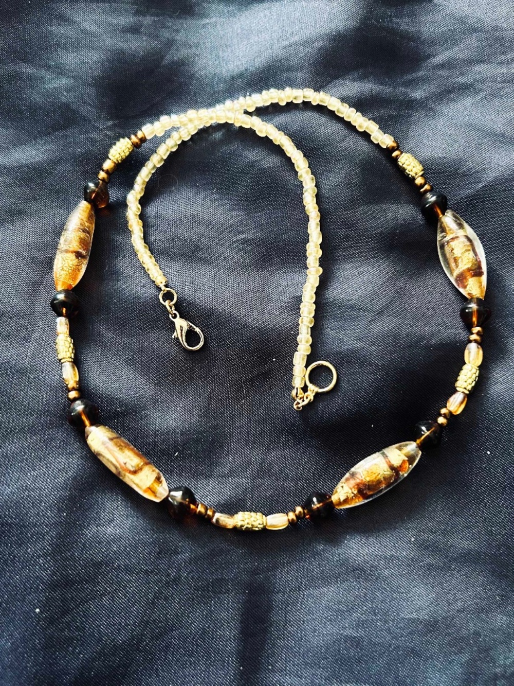 NECKLACE BLOWN GLASS OVALS GOLD/BLACK WITH GOLD/BLACK/GOLD TONE BEADS AND GOLD